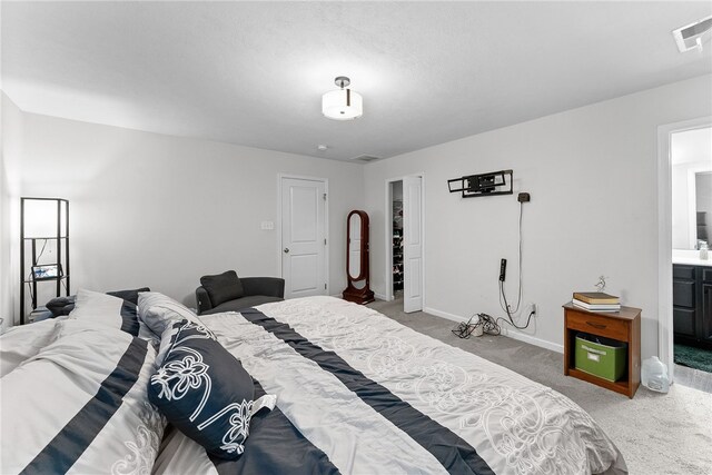 106 Morgan Dr, South Strabane, PA 15301 - carpeted bedroom featuring baseboards, ensuite bathroom, and visible vents