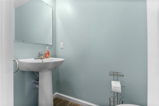 106 Morgan Dr, South Strabane, PA 15301 - bathroom featuring baseboards and wood finished floors