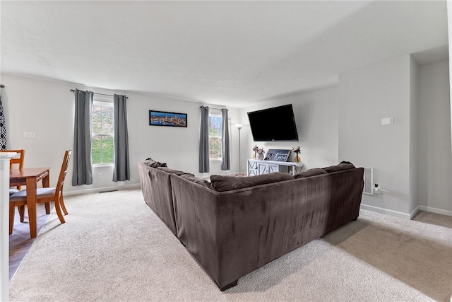106 Morgan Dr, South Strabane, PA 15301 - living room with baseboards and light carpet
