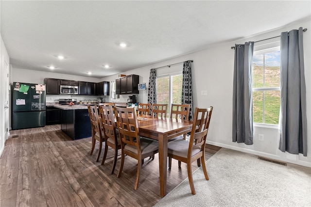 106 Morgan Dr, South Strabane, PA 15301 - dining space with baseboards, wood finished floors, visible vents, and recessed lighting