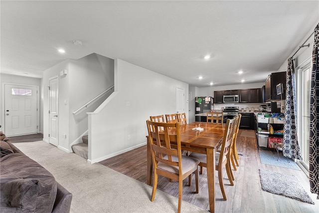 106 Morgan Dr, South Strabane, PA 15301 - dining space featuring baseboards, recessed lighting, and stairs