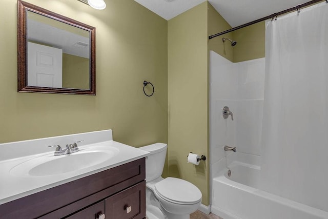bathroom with toilet, vanity, and shower / bathtub combination with curtain