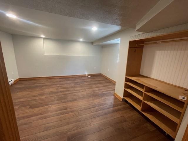 6605 Woodwell St, Squirrel Hill, PA 15217 - finished basement with dark wood finished floors, baseboards, and recessed lighting