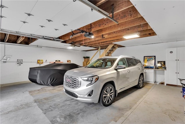 garage featuring a garage door opener