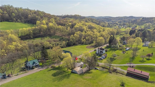 aerial view with a rural view and a forest view