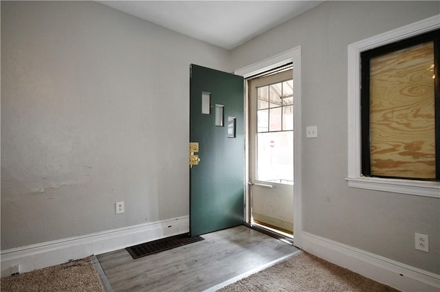 2331 Jane St, South Side, PA 15203 - doorway featuring baseboards and wood finished floors