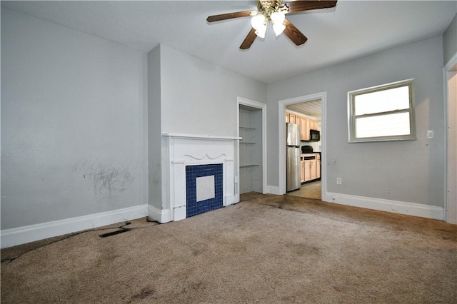 2331 Jane St, South Side, PA 15203 - unfurnished living room with a tile fireplace, carpet floors, a ceiling fan, and baseboards