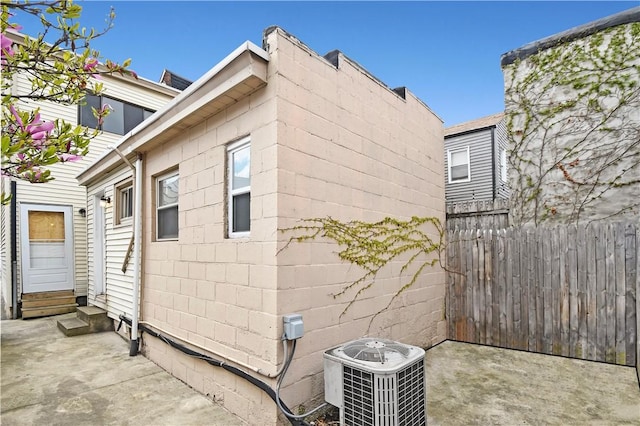 2331 Jane St, South Side, PA 15203 - view of property exterior featuring entry steps, central air condition unit, and a patio area
