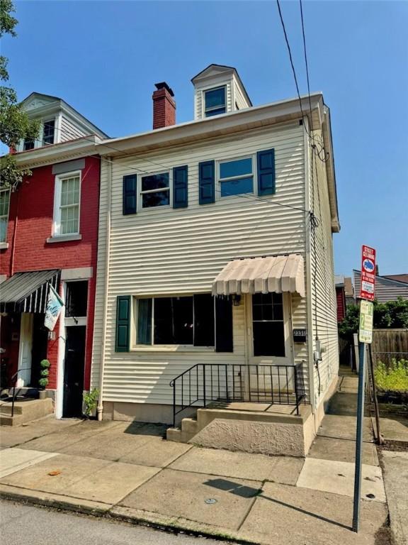 2331 Jane St, South Side, PA 15203 - view of front of property featuring a chimney