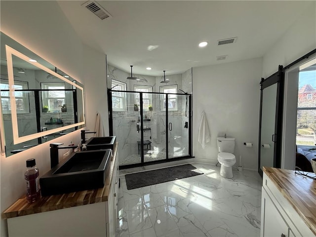 6755 Mcpherson Blvd, Point Breeze, PA 15208 - full bathroom featuring recessed lighting, a shower stall, visible vents, and toilet