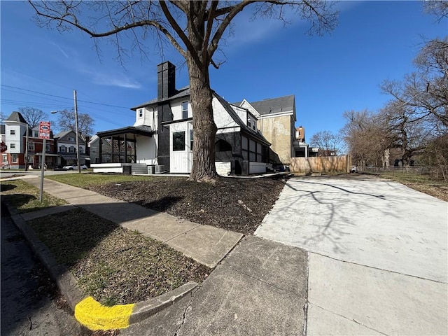 6755 Mcpherson Blvd, Point Breeze, PA 15208 - view of side of home with fence and a chimney