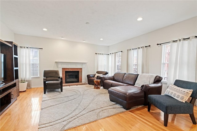 1743 Holmes Dr, Franklin Park, PA 15143 - living area featuring recessed lighting, a wealth of natural light, light wood finished floors, and a fireplace
