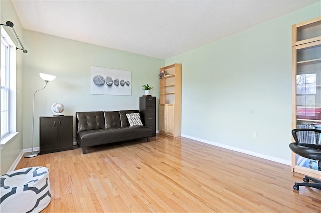 1743 Holmes Dr, Franklin Park, PA 15143 - living area featuring light wood-style flooring and baseboards
