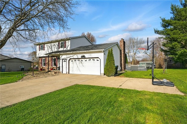 view of front of property featuring a garage, driveway, a chimney, and a front yard