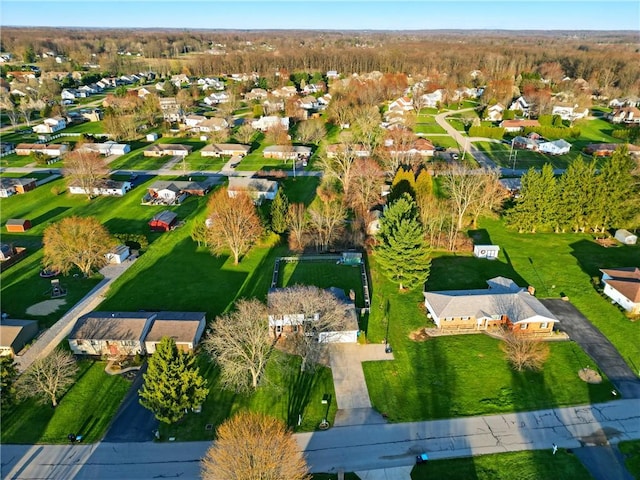 birds eye view of property with a residential view