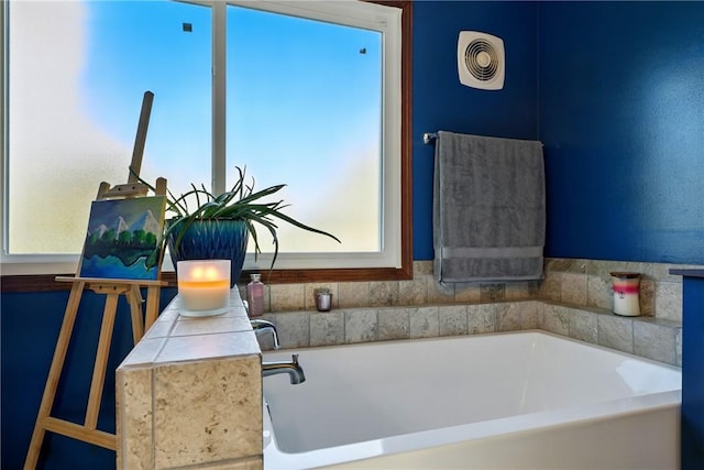 full bathroom featuring a bath and visible vents