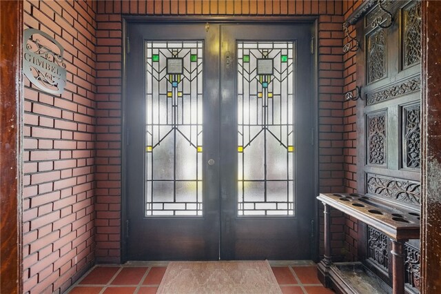 5818 Aylesboro Ave, Squirrel Hill, PA 15217 - foyer featuring french doors and tile patterned flooring