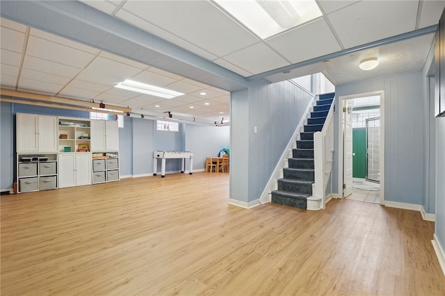 5818 Aylesboro Ave, Squirrel Hill, PA 15217 - basement with stairs, light wood-style floors, and baseboards