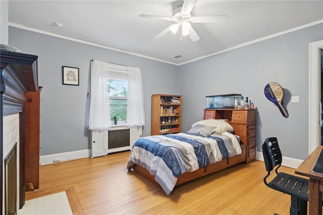 5818 Aylesboro Ave, Squirrel Hill, PA 15217 - bedroom featuring light wood-type flooring, baseboards, crown molding, ceiling fan, and a fireplace