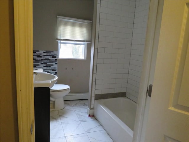 bathroom with vanity, marble finish floor, toilet, shower / bath combination, and a baseboard radiator