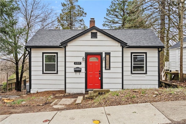 2215 Lehigh St, Swissvale, PA 15218 - bungalow-style house with a chimney and a shingled roof