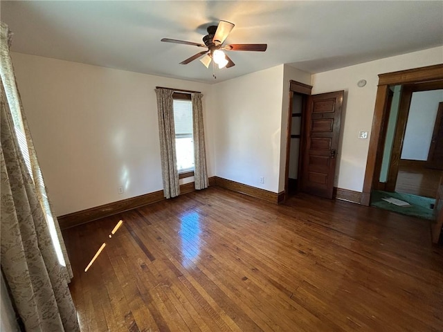 509 W Erie St, Linesville Boro, PA 16424 - empty room featuring hardwood / wood-style flooring, baseboards, and ceiling fan