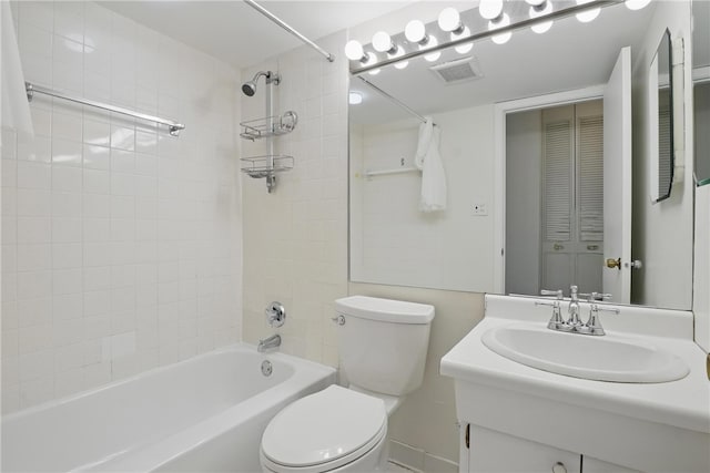full bath featuring toilet, vanity, bathtub / shower combination, and visible vents