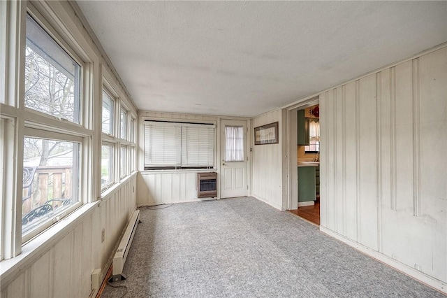 120 Arden Dr, Shaler, PA 15116 - unfurnished sunroom with a baseboard heating unit, a textured ceiling, a wealth of natural light, and heating unit