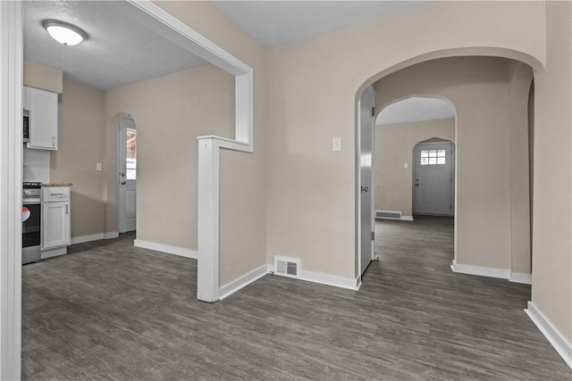 138 W Larkspur St, Munhall, PA 15120 - interior space with baseboards, dark wood-type flooring, and visible vents