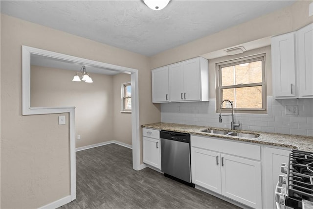 138 W Larkspur St, Munhall, PA 15120 - kitchen featuring tasteful backsplash, a sink, stainless steel appliances, white cabinets, and baseboards