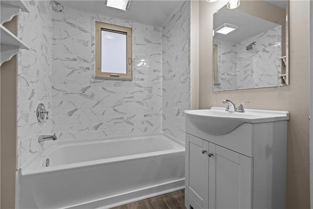 138 W Larkspur St, Munhall, PA 15120 - full bath with bathtub / shower combination, wood finished floors, and vanity