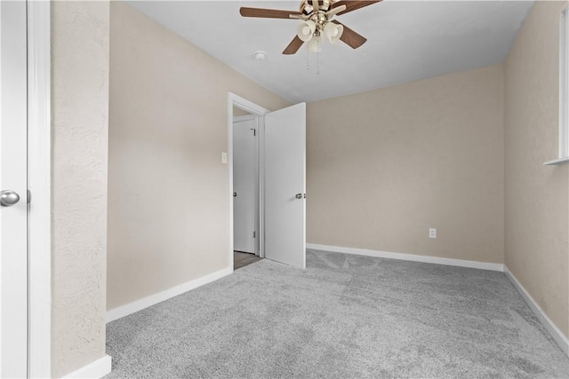 138 W Larkspur St, Munhall, PA 15120 - unfurnished bedroom featuring carpet flooring, baseboards, and a ceiling fan