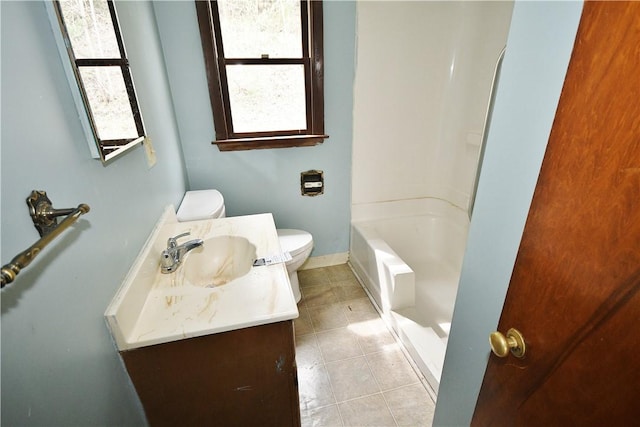 bathroom featuring tile patterned floors, toilet, a washtub, a shower, and vanity