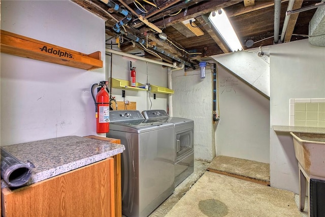 clothes washing area with laundry area and washing machine and dryer