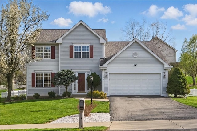 827 Brookfield Dr, Seven Fields Boro, PA 16046 - view of front facade featuring an attached garage, driveway, and a shingled roof