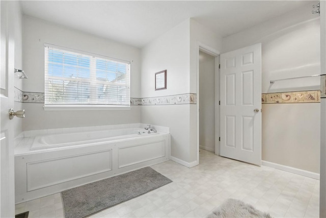 827 Brookfield Dr, Seven Fields Boro, PA 16046 - full bath featuring tile patterned floors and a garden tub