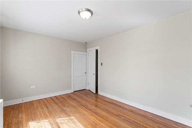 2006 Locust St, Swissvale, PA 15218 - unfurnished room with baseboards and light wood-type flooring