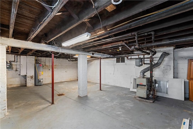 2006 Locust St, Swissvale, PA 15218 - unfinished basement with water heater and a heating unit