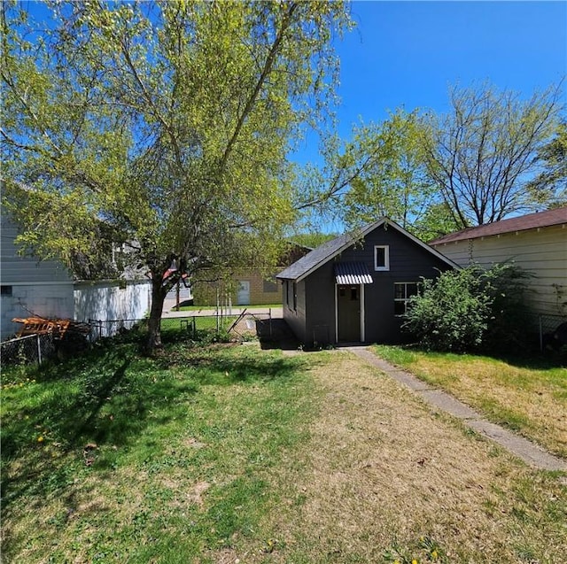 view of yard with fence