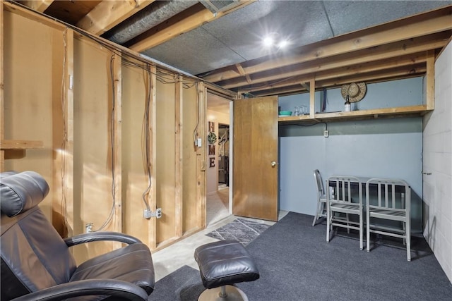 unfinished basement with carpet