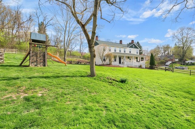 1 Alton Dr, Bethel Park, PA 15102 - exterior space featuring fence, a playground, and covered porch
