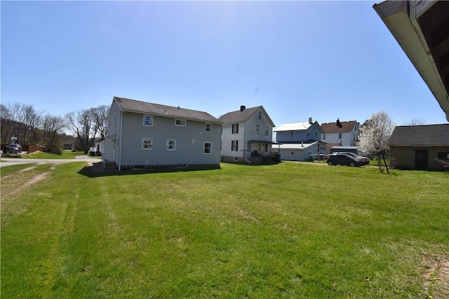 view of yard featuring a residential view