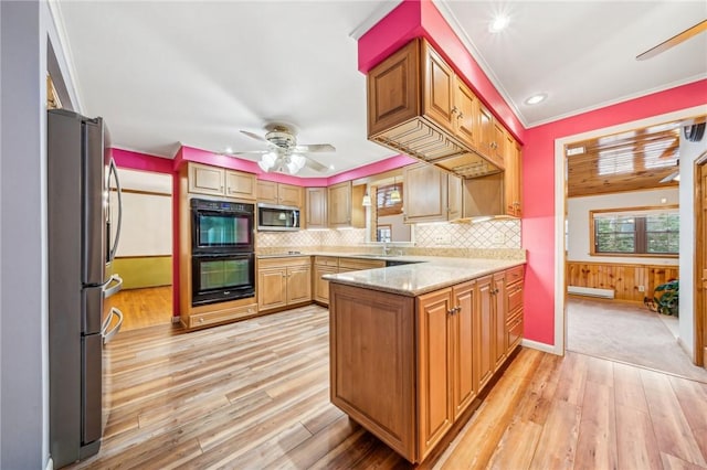 kitchen with a ceiling fan, decorative backsplash, light wood-type flooring, a peninsula, and appliances with stainless steel finishes