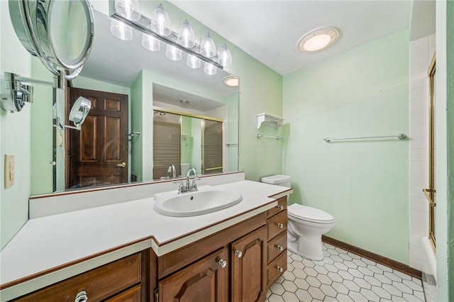 bathroom with a shower with shower door, tile patterned flooring, toilet, vanity, and baseboards
