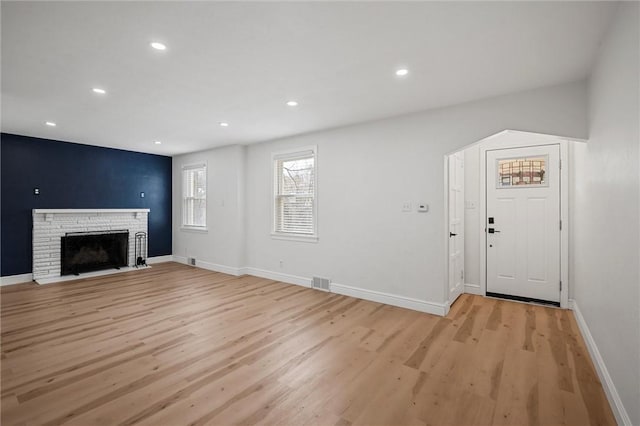 211 Wainwright Ave, Brentwood, PA 15227 - unfurnished living room featuring baseboards, recessed lighting, visible vents, and light wood-style flooring