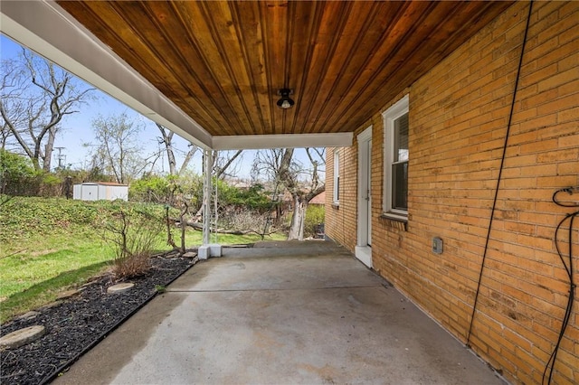 211 Wainwright Ave, Brentwood, PA 15227 - view of patio / terrace featuring a storage unit and an outbuilding