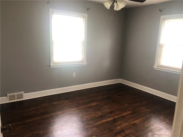159 Oakville Rd, Chippewa Twp, PA 15010 - empty room with dark wood-style floors, ceiling fan, and baseboards