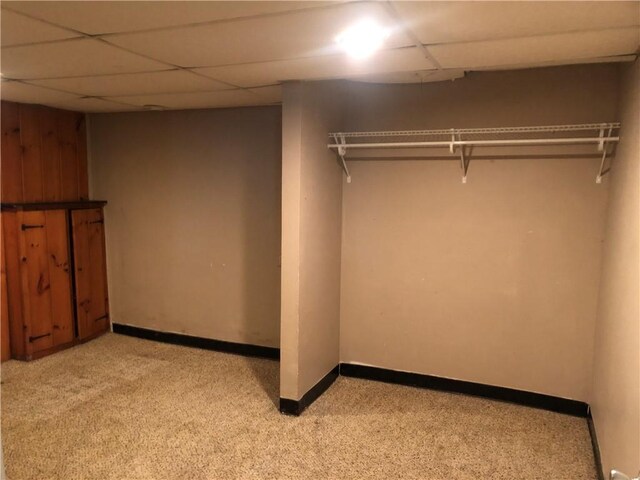 159 Oakville Rd, Chippewa Twp, PA 15010 - finished basement with light carpet, baseboards, and a paneled ceiling