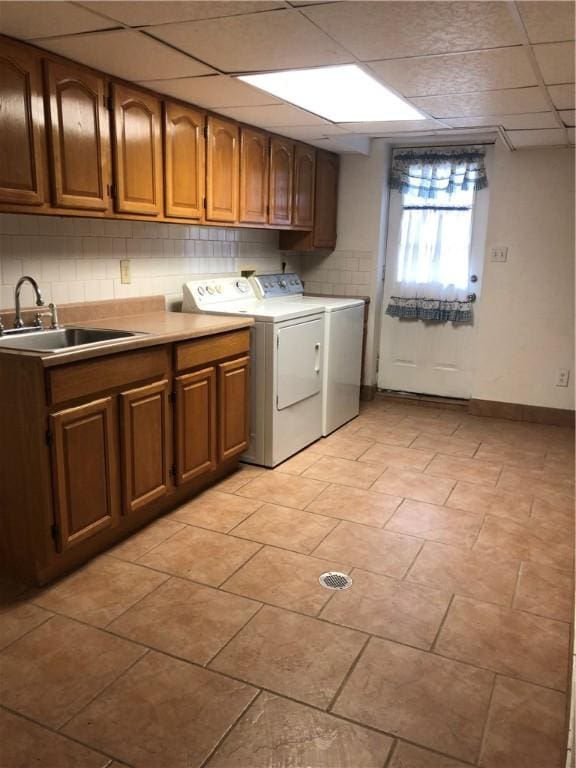 159 Oakville Rd, Chippewa Twp, PA 15010 - washroom featuring washing machine and dryer, cabinet space, and baseboards