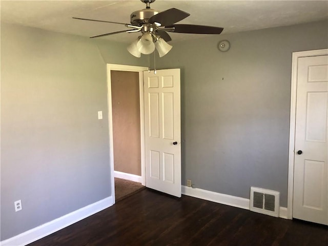 159 Oakville Rd, Chippewa Twp, PA 15010 - empty room with a ceiling fan, baseboards, and dark wood-style floors